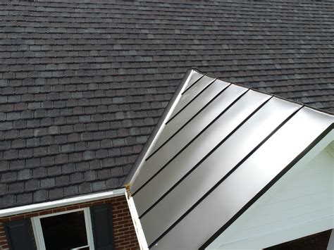 metal roof to shingle roof